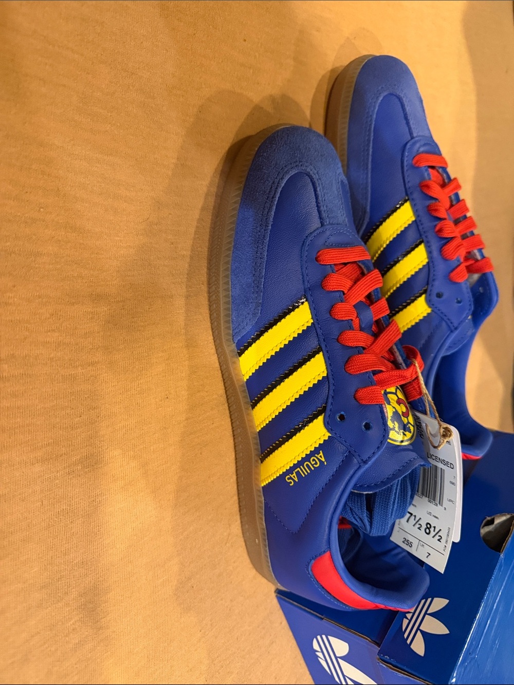 adidas Men’s Royal Blue Sneakers with Yellow Stripes and Red Laces